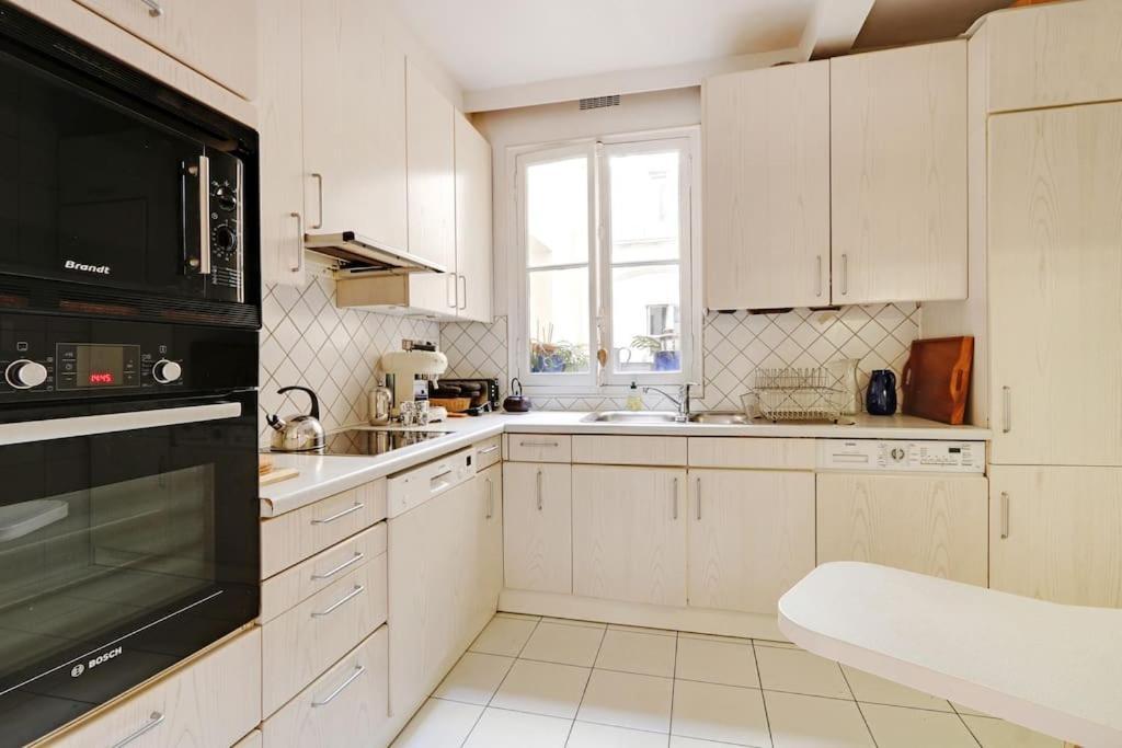 Sejour Au Pied De La Tour Eiffel Appartement Parijs Buitenkant foto